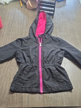 Nike Kids Black Raincoat with Hot Pink Lining and Zipper